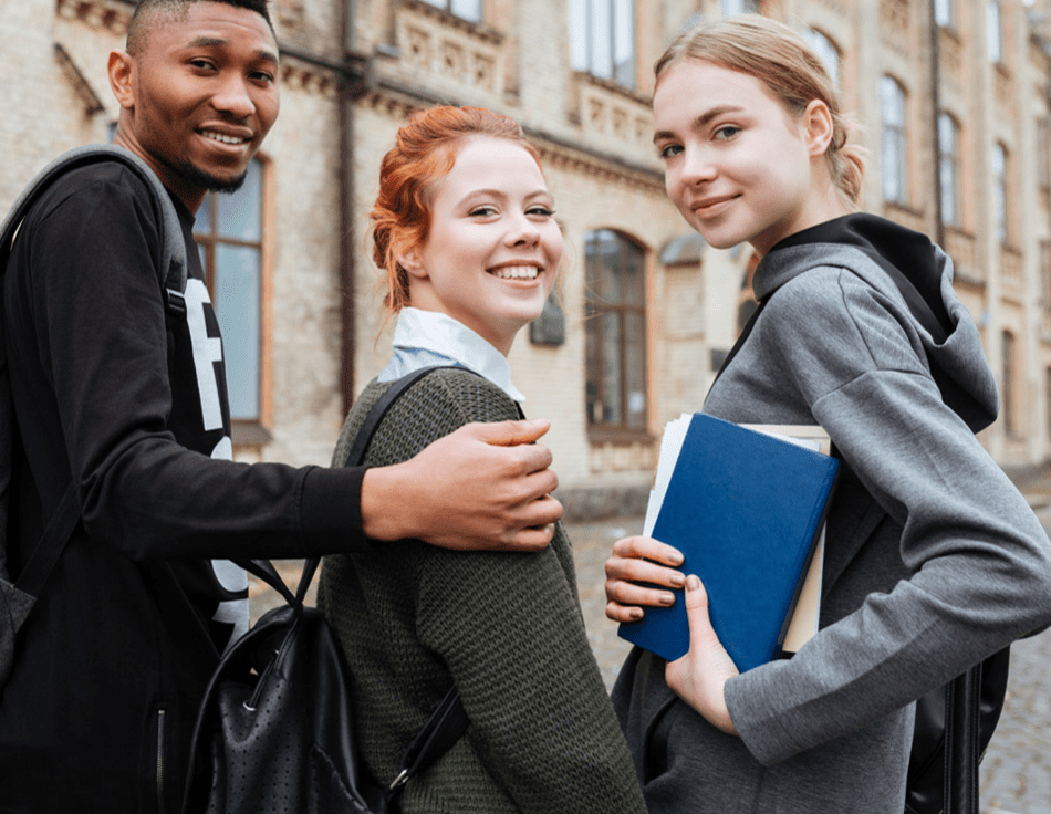 Three students are posing for a picture.