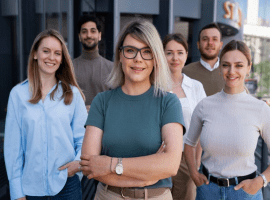 A group of people standing in front of each other.
